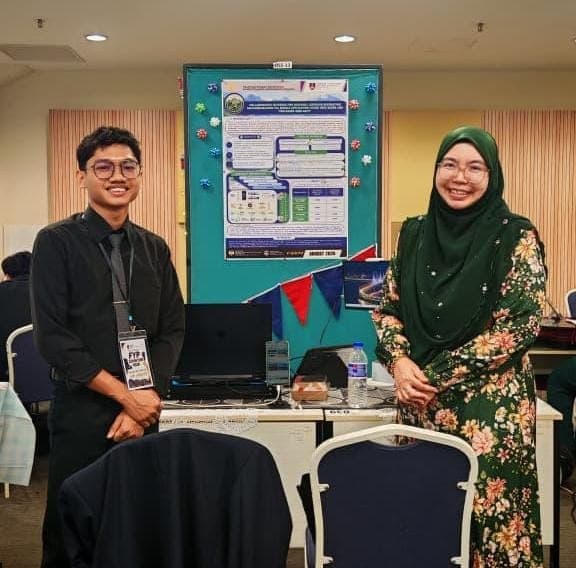 At a student project booth during the FYP exhibition